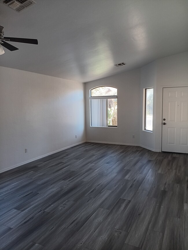 Living room looking at front door - 2411 E Stone Stable Dr