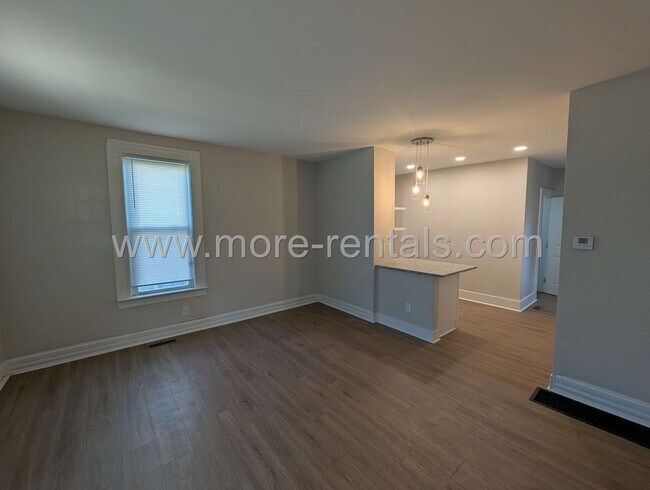 Foto del edificio - Remodeled house with fenced yard and garage