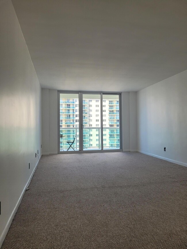 Building Photo - 19380 Collins Ave