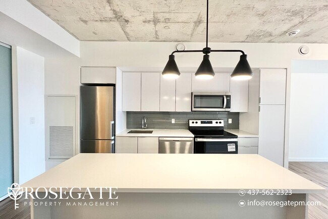 Photo du bâtiment - Modern 1-Bedroom Condo in Brantford – 551 ...