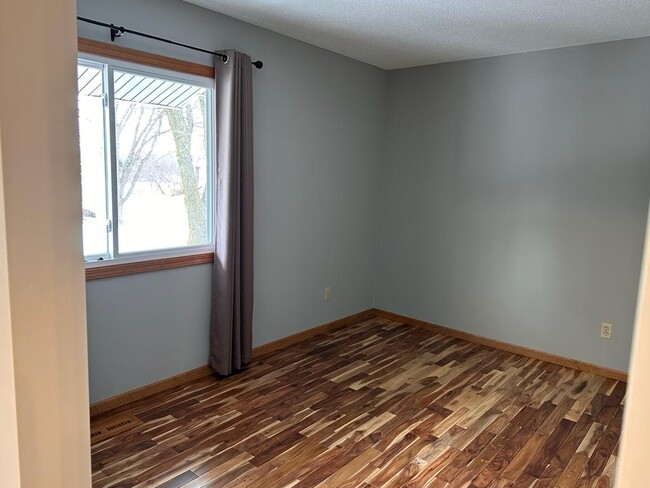 seating & closet area in room 1 - 9748 Cavell Ave S