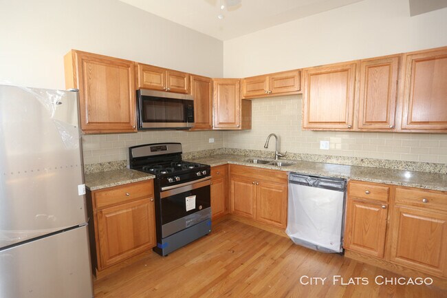Foto del edificio - 1052 N Oakley Blvd