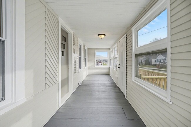 Building Photo - Updated First-Floor 2BR with Garage Parking and On-Site Laundry