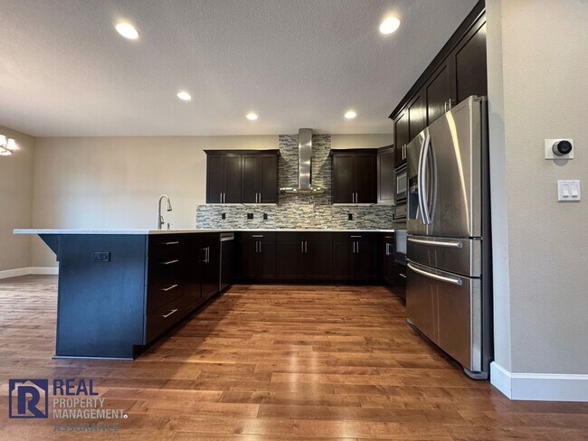 Building Photo - 5-Bedroom Home with Modern Upgrades & 2-Car Garage!!