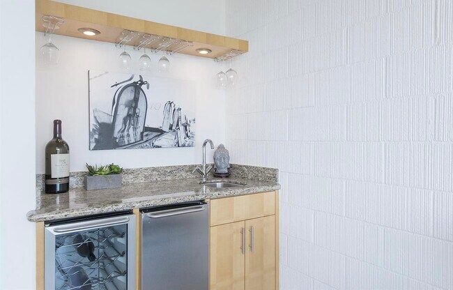 Wet bar with wine and beverage fridge - 1 Kelton Ct