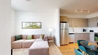 This thoughtfully designed 1-bedroom, 1-bathroom residence at 1001 W Elizabeth Ave in Linden, NJ offers a modern, functional layout finished with warm hardwood-style flooring throughout. The open-concept kitchen flows seamlessly into the living and dining areas, creating an inviting, connected space. The kitchen is outfitted with gray shaker-style cabinetry, white subway tile backsplash, light quartz countertops, and a full suite of stainless steel appliances including a refrigerator, dishwasher, range, and over-the-range microwave. Track lighting overhead adds a contemporary touch. The living room benefits from large windows that allow generous natural light and offer outdoor views, complementing the bright, neutral color palette throughout. The bedroom is a comfortable retreat featuring oversized windows with outdoor views, hardwood-style flooring, and in-unit stacked washer and dryer conveniently tucked within the space. Three closets provide ample storage. The bathroom continues the clean, modern aesthetic with hardwood-style flooring and gray vanity cabinetry. A hallway connects the rooms efficiently, enhancing the overall flow of this well-planned residence located in Linden, New Jersey.