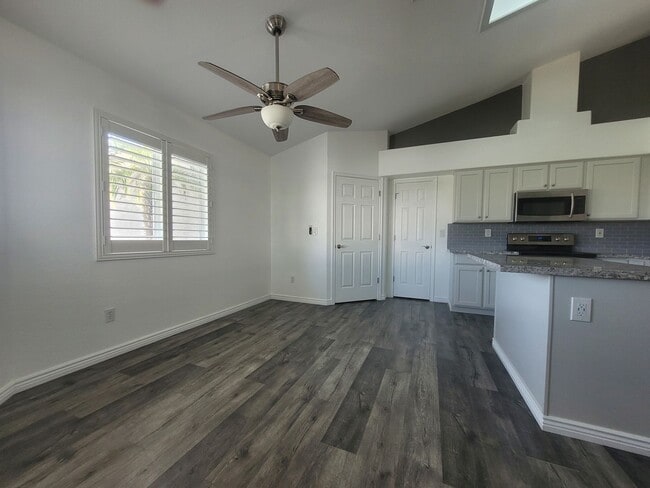 Building Photo - ChatGPT said: Beautiful 3-Bed Home in Dese...