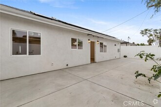 Building Photo - 8853 Remick Ave