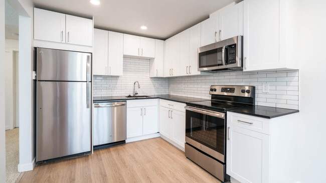 Kitchen with Stainless Steel Appliances - Redmond Court