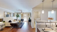 Located in Columbus, GA, this single-story, 2-bedroom, 2-bathroom home offers a thoughtfully designed layout with comfortable living spaces throughout. The open-concept living room features rich hardwood flooring, crown molding, a ceiling fan, and large windows that invite natural light and offer outdoor views. Adjacent to the living area, the dining room is accented by a chandelier and flows seamlessly into the kitchen, which is equipped with dark wood cabinetry, granite countertops, a tile backsplash, and black appliances including a range and built-in microwave. The primary bedroom is a well-sized retreat with plush carpeting, a ceiling fan, and a generously sized walk-in closet with wire shelving. Both bathrooms feature dark wood vanities with countertop sinks and a tub-shower combination. A dedicated in-unit laundry room houses a full-size washer and dryer with overhead shelving for added storage. Three closets throughout the home provide ample storage options. The neutral color palette and warm finishes create a cohesive and inviting ambiance across all rooms.