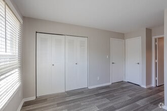 (R) RENOVATED THE FLOWERING DOGWOOD 1BR, 1BA - 700 SF - Bedroom - Woodbridge Place Apartments
