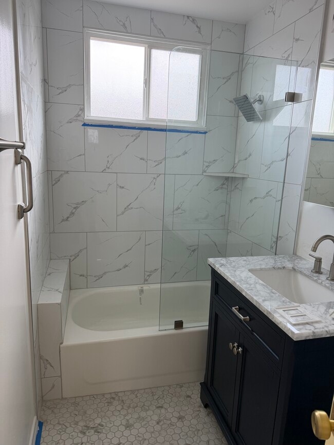 Marble bath-shower and vanity - 701 Indiana Ave