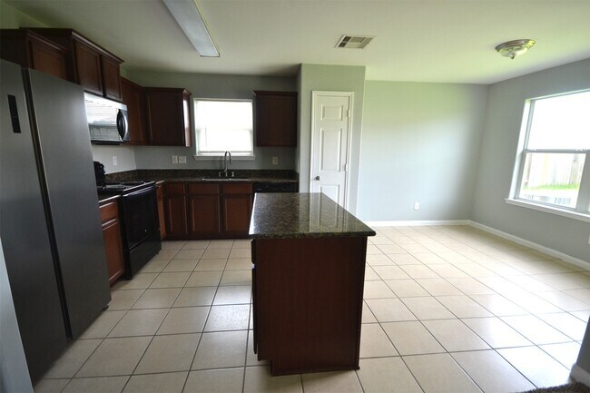 Foto del edificio - 6958 Chessgate Falls Ln