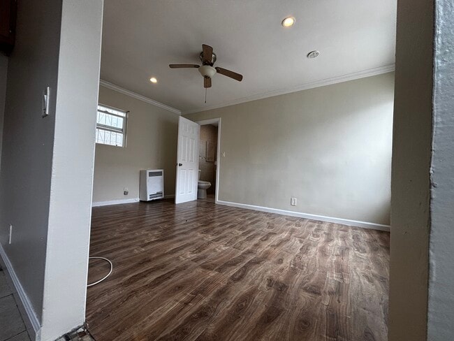Large room with fan - 3740 W Slauson Ave