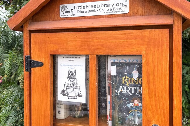 Little community libraries stand on residential corners of Colton, San Bernardino.