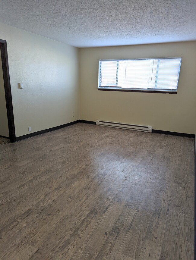 1200-1360 1 bedroom unit-living room - Meadowview Apartments