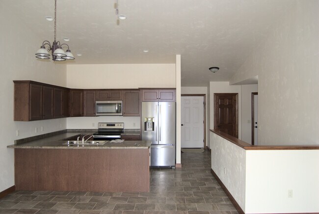 Living Room looking into Kitchen - N1710 Lily of the Valley Dr