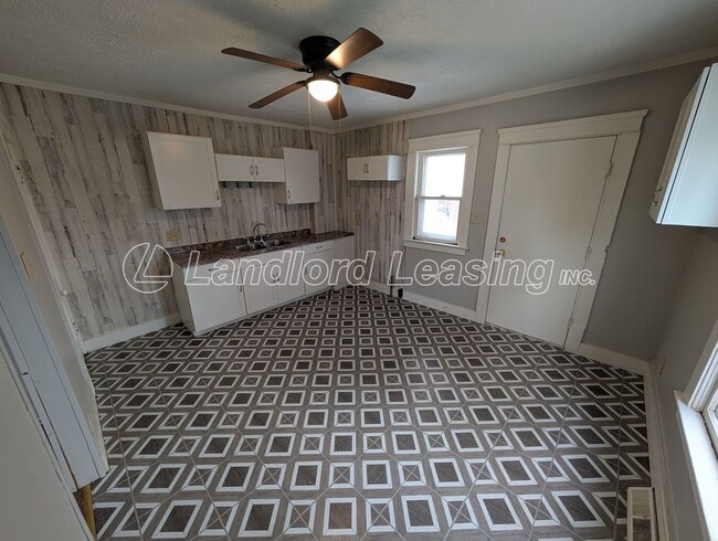 Building Photo - Updated Two-Bedroom Townhome with Lawn Care Included