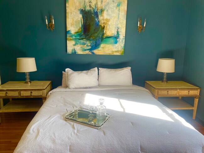área de cama de estudio - Los Altos Apartments