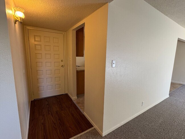 Building Photo - Three Bed, Two Bath Home with New Carpet a...