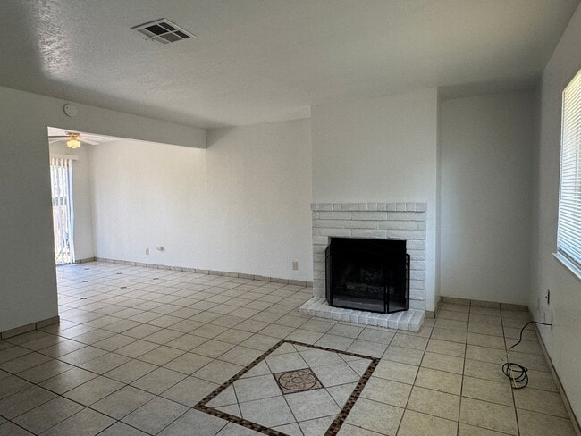 Building Photo - Two Bedroom Triplex with One Bathroom and ...