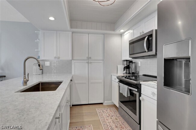 Foto del edificio - 10475 Gulf Shore Dr