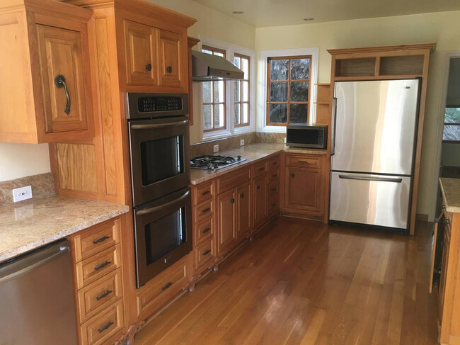 Kitchen looking toward laundry room and powder - 6123 Scenic Ave