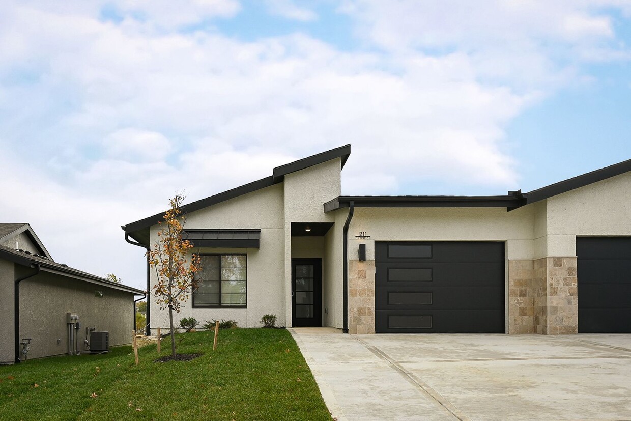 Primary Photo - Two Bedroom Twin Villa with 1-Car Garage