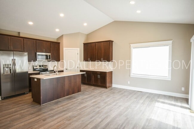 Building Photo - Two free months rent! New 4 Bedroom Ranch in Clive with finished Basement.