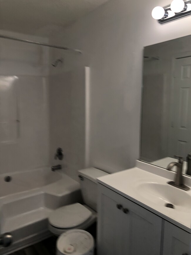 downstairs bath with garden tub - 6933 Stonewall Place