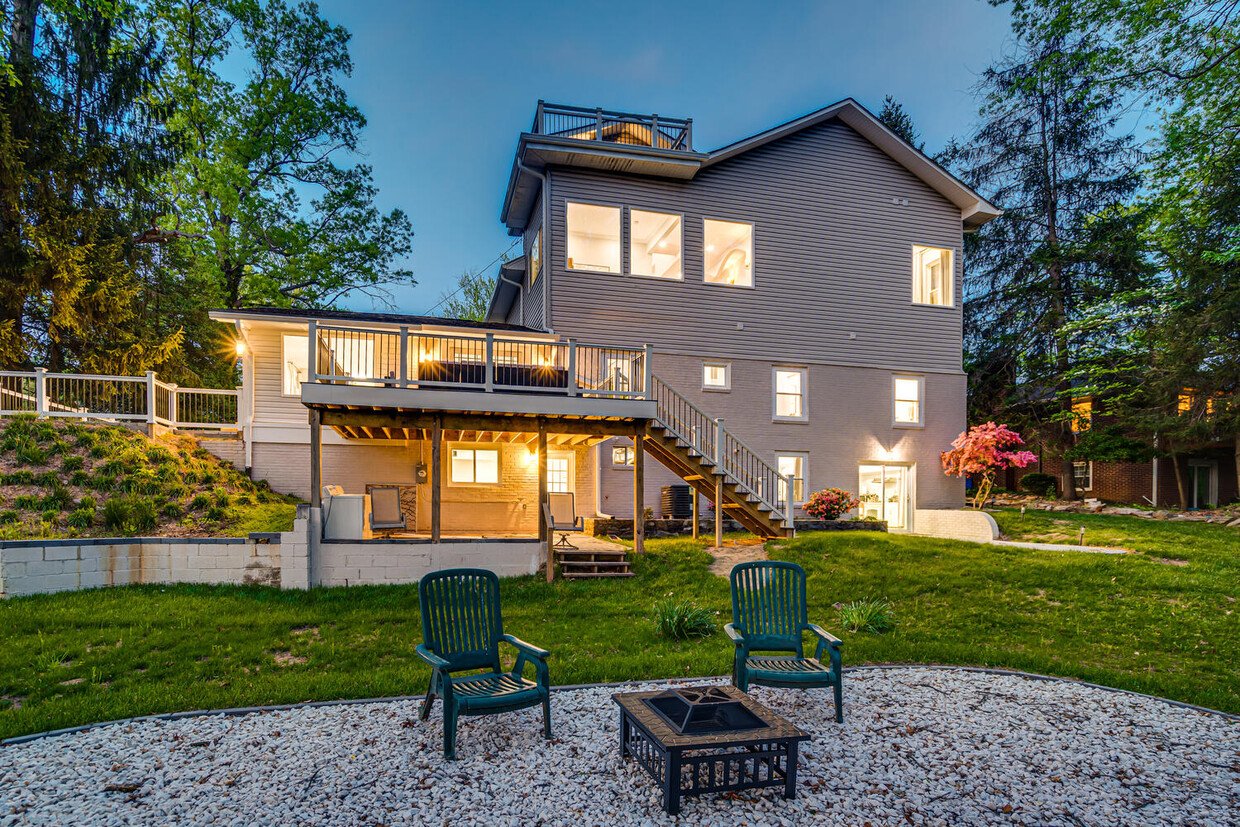 Back of the house showing entry to the unit on the far right - 9432 Emory Grove Rd