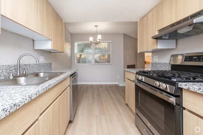 2BR, 1BA - 938SF - Kitchen - Villas Las Toronjas II Apartments