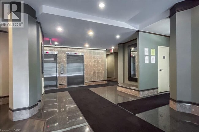 Building Photo - 67 Caroline St S