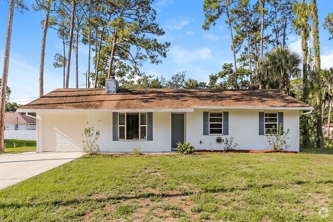 Building Photo - 8403 Deland Ave