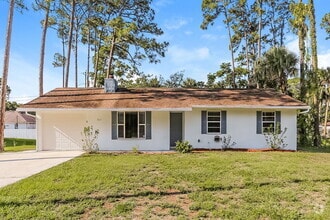 Building Photo - 8403 Deland Ave