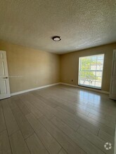 Building Photo - 10814 N Kendall Dr