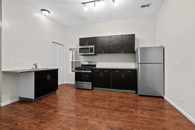 Foto del edificio - 4608 S Evans Ave