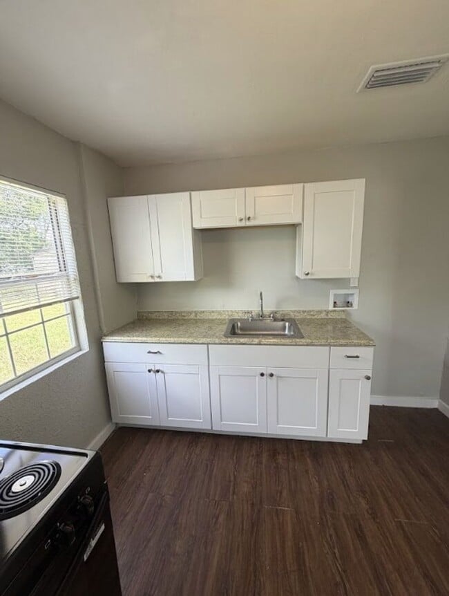 Building Photo - Charming Updated Home with New Kitchen & HVAC