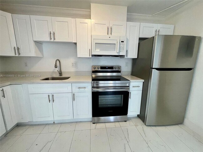 Building Photo - 4660 NW 79th Avenue 1B, Doral, FL 33166