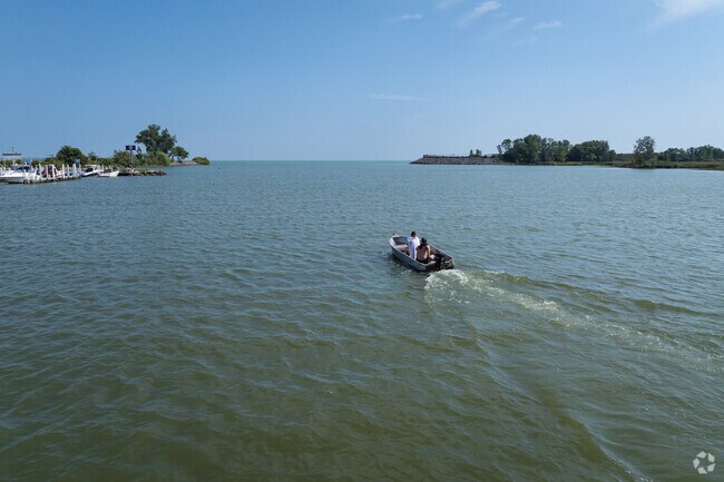 Monroe boaters plot their course out toward open water in Lake Erie.