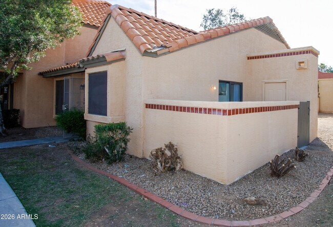 Building Photo - 5704 E Aire Libre Ave