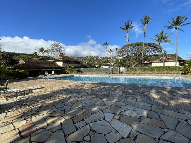Building Photo - TROPIC GARDENS 2/2/1 split-level, end unit...