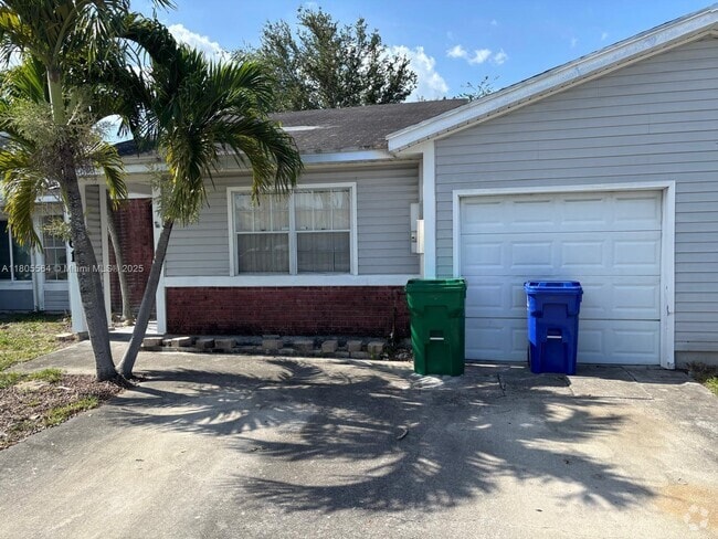 Building Photo - 9761 W Heather Ln