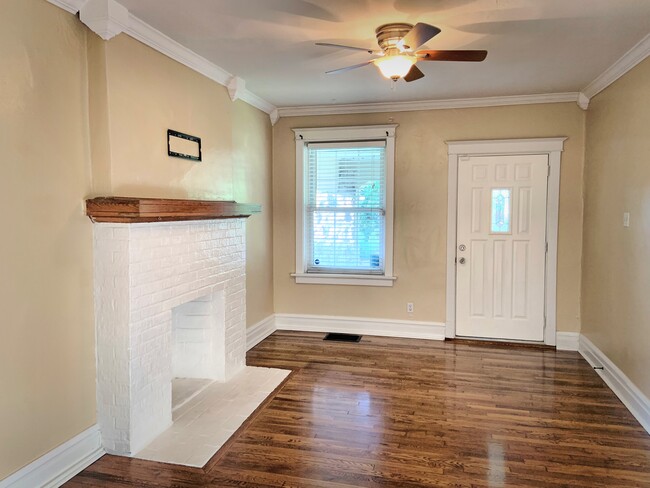 Living room with faux fireplace - 4051 Utah St