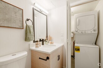 1BR, 1 BA - 768SF - Bathroom - North X Northwest Apartments