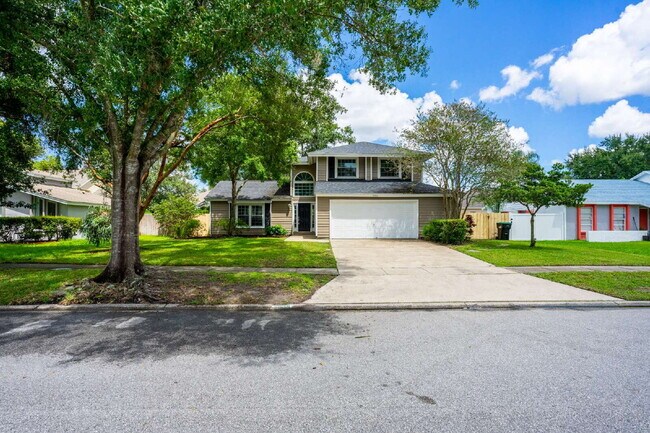 Foto del edificio - Minutes from UCF | Updated 4BR/3BA Home with Private Fenced Backyard