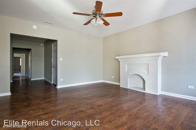 Building Photo - 4 br, 1 bath Apartment - 7542 S. Colfax Ave.