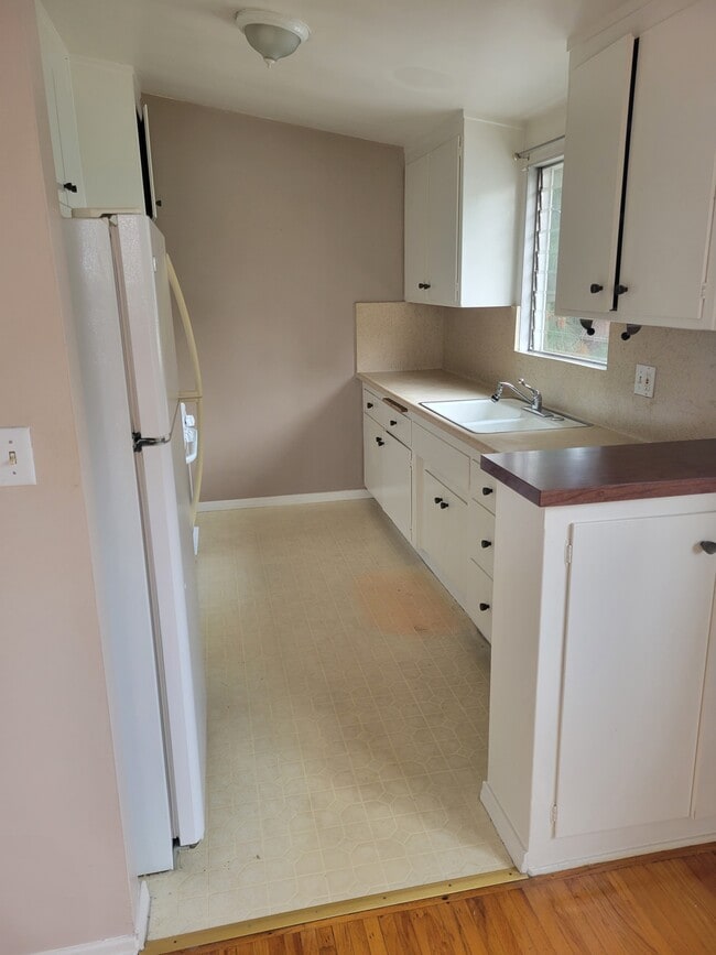 Kitchen (floors, counters to be replaced, dishwasher added) - 2318 10th St