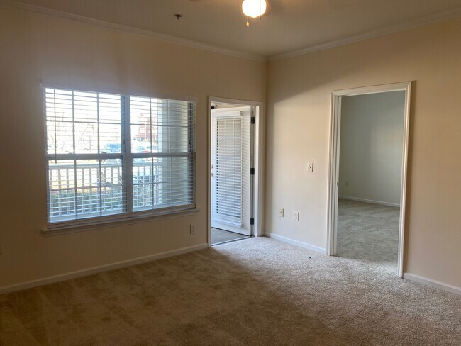 Living room looking towards outdoor patio - 511 Village Lake Ct