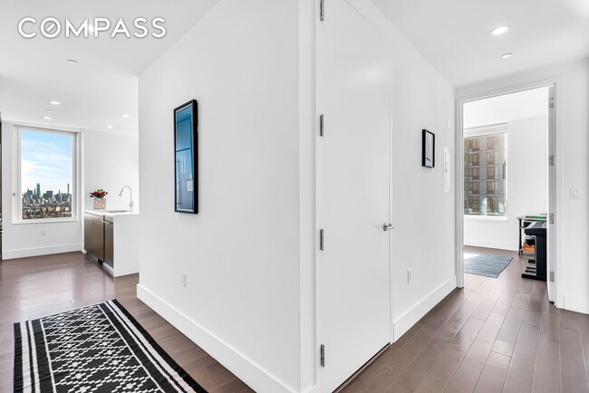 Building Photo - Elegant Condo Living with Impressive Views and Exclusive Building Amenities in the Heart of Downt...